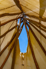 Looking up inside the indigenous tipi, Alberta, Canada