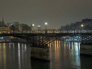 River Seine with Pont des Arts and Institut de France in Paris France