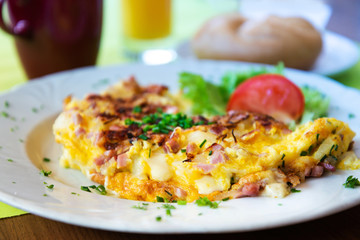 omelet with ham tomato and green salad