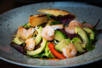 Fried shrimp-delicious fried shrimp with lettuce and rice in white plate