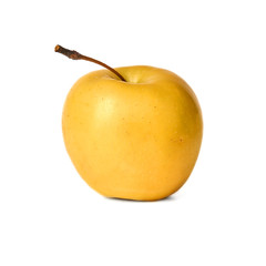 Ripe yellow apple isolated on white background
