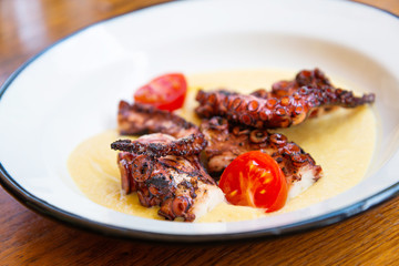 Mediterranean Octopus with vegetables and potatoes