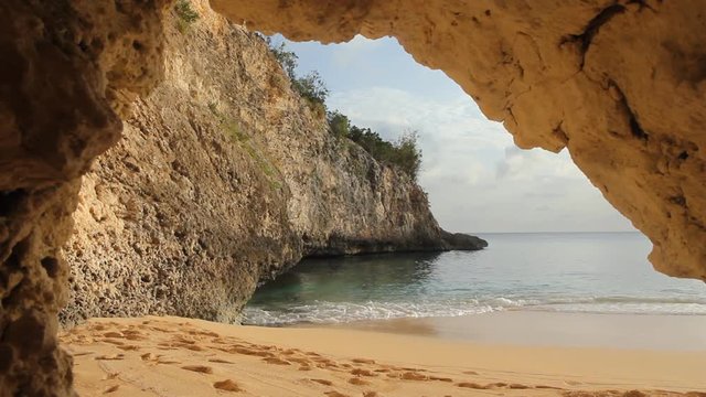Cave view of cove at Baie Longue in St Martin, Caribbean.
