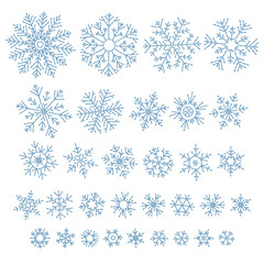 Set of different doodle snowflakes