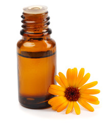 Oil and calendula flowers isolated on white