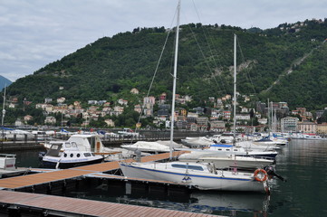 Boats at the pier. Lake Como in Italy.