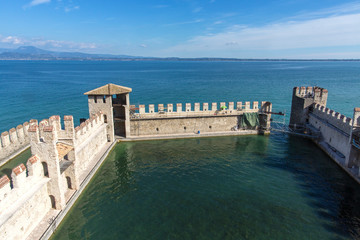 Medieval castle in Sirmione, Italy. Sirmione, northern Italy. medieval castle Scaliger on lake Garda.