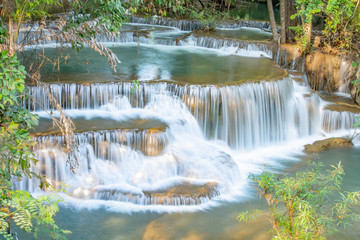 Fototapeta na wymiar Waterfall flowing from the mountains at Huay Mae khamin waterfall National Park ,Kanchana buri in Thailand.