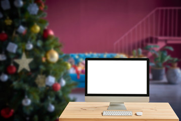 Christmas tree blur and computer screen interior.