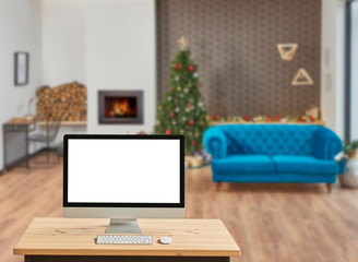 Christmas promotion via internet, computer screen and Christmas living room.