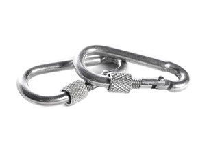 Isolated mountaineering in two object metal carbine is fastened. Set of climbing and camp...