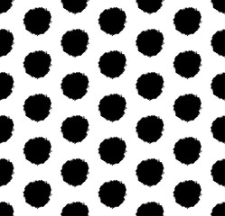 Hand drawn polka dot background with round brush strokes. Abstract stylish texture. Vector seamless pattern.