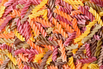 italian pasta fusilli colorful background