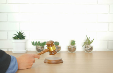 judge hold legal law gavel at courtroom. lawyer attorney justice at court