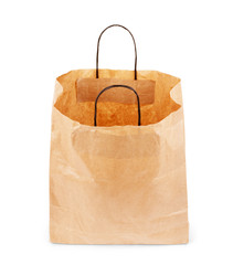 Brown paper bag on white background