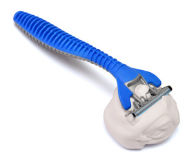 Men's razor and shaving foam isolated on white background. Creative concept. Flat lay, top view