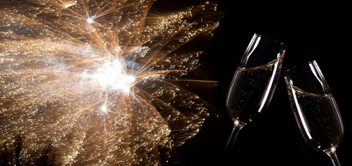  New year background with fireworks and champagne
