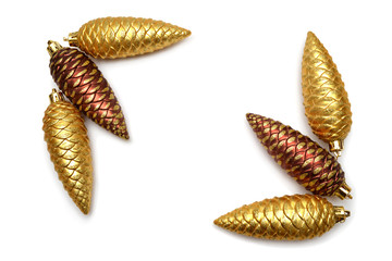 Creative christmas composition of pine cones toys isolated on white background. New Year wreath. Flat lay, top view