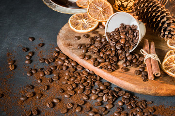 Still life with coffee beans, cinnamon and decorations