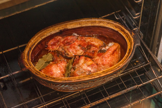 a chicken, roast meat, cook in oven
