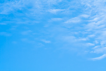 Background of blue sky with white clouds