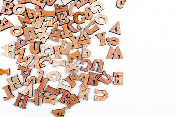 Jumbled letters made of wood close up