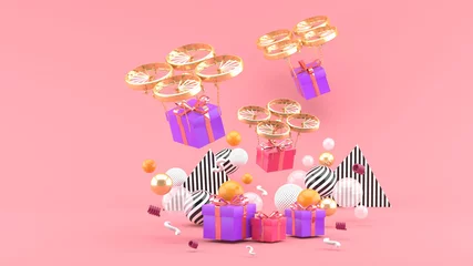 Fototapeten Drone delivers a gift box among colorful balls on a pink background.-3d render.. © Garfieldbigberm