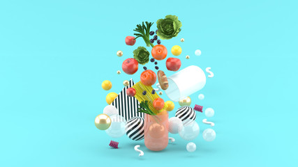 The food floats out of the capsule amidst colorful balls on the blue background.-3d render..