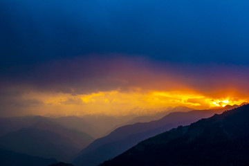 Sunrise over the Pir Panjal Range, clouds, raining, sunrise through the clouds, sunrise over the himalayas, rainy season