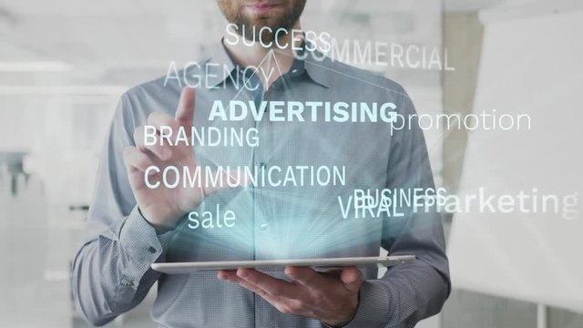 advertising, marketing, promotion, sale, business word cloud made as hologram used on tablet by bearded man, also used animated commercial success branding communication word as background in uhd 4k