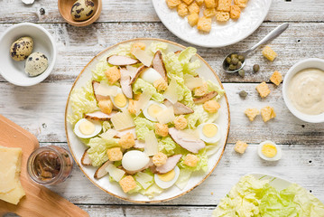 Caesar salad on a white background