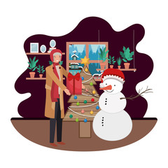 man in livingroom with christmas tree