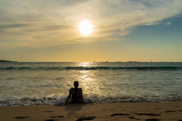 silhouette of woman on the beach