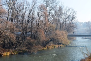 a pedestrian bridge in autumn
