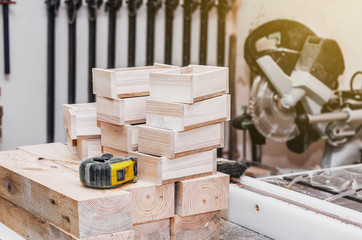 Wooden boxes, blanks in the carpentry workshop. Wood products. Manual production. Natural