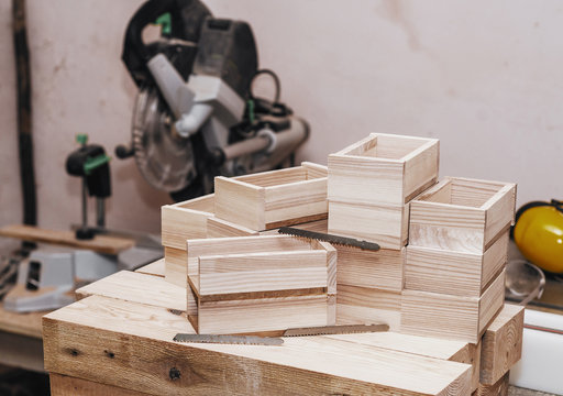 Wooden boxes, blanks in the carpentry workshop. Wood products. Manual production. Natural
