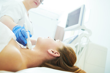Obraz na płótnie Canvas ultrasound scan. Examining the thyroid gland of female patient