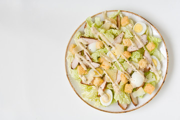 Caesar salad on a white background