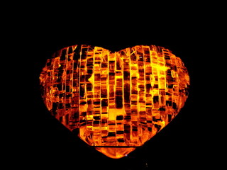 Heart of lava fragments. Broken and glued hot heart.