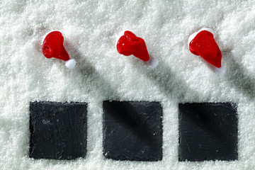 Christmas composition on snow with a free place for an advertising product  