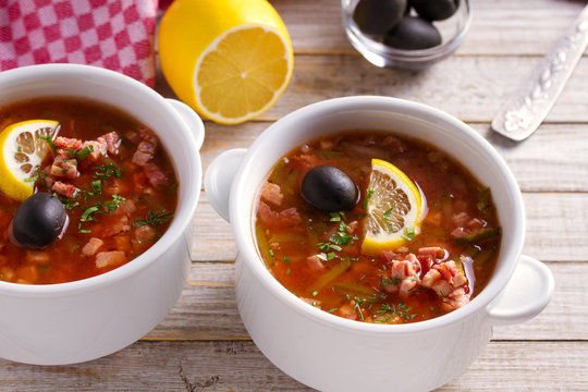 Traditional Russian dish  solyanka - thick, spicy and sour saltwort soup
