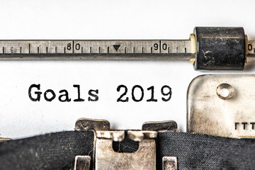 Goals 2019 typed words on a vintage typewriter. Close up