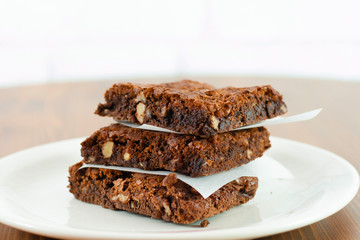 Chocolate brownie with hot chocolate melting sauce on it.