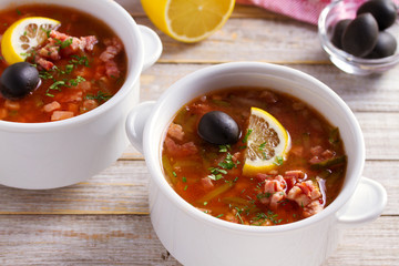 Traditional Russian dish  solyanka - thick, spicy and sour saltwort soup