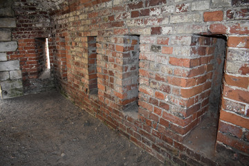 Brick-walled architectural tunnel or passageway