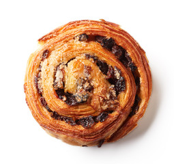 Sweet bun with raisins isolated on white, from above