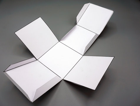 Geometry net of cube . 2-dimensional shape that can be folded to form a 3-dimensional shape or a solid. Unfolded three Dimensional Figures. Isolated. 