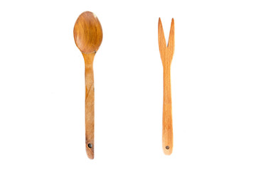 Wooden fork and spoon on white background
