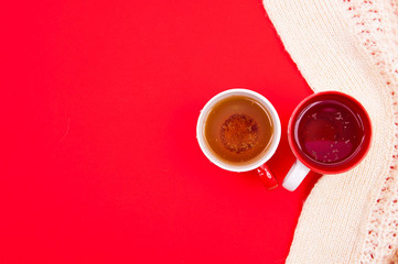 Cup of tea on the red background 