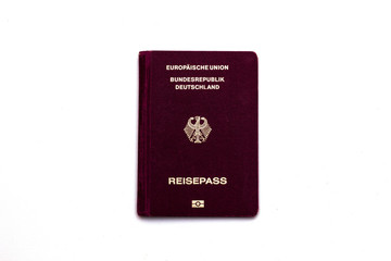 Red german passport isolated on white background.